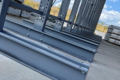 cantilever rack, storage solution, warehouse organization, bulky item storage, long item storage, lumber storage, steel bar storage, pipe storage, furniture storage, open-front design, easy access, space optimization, adjustable arms, heavy-duty storage, durable construction, storage system, inventory management, industrial storage, retail storage, manufacturing storage, storage efficiency